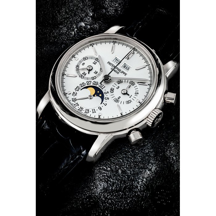 PATEK PHILIPPE. AN 18K WHITE GOLD PERPETUAL CALENDAR CHRONOGRAPH WRISTWATCH WITH MOON PHASES, 24 HOUR AND LEAP YEAR INDICATION REF. 3970E, MANUFACTURED IN 1994