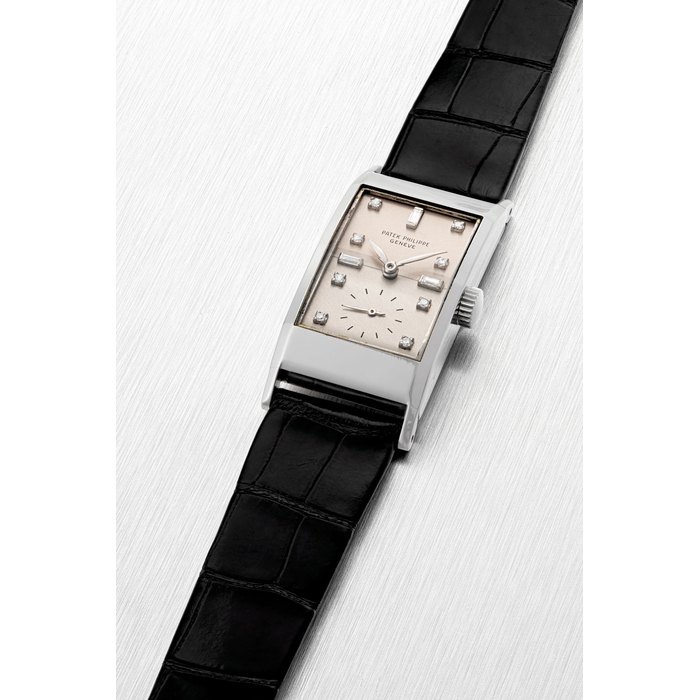Patek Philippe PATEK PHILIPPE. A PLATINUM AND DIAMOND-SET WRISTWATCH REF. 425, MANUFACTURED IN 1947, Price & Market Data