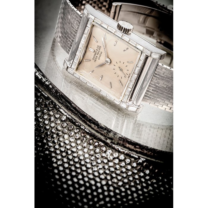 PATEK PHILIPPE. A SUPERB AND VERY RARE PLATINUM AND BAGUETTE-CUT DIAMOND-SET WRISTWATCH WITH DETACHABLE TIFFANY & CO. BRACELET REF. 2496 RETAILED BY TIFFANY & CO., MANUFACTURED IN 1959