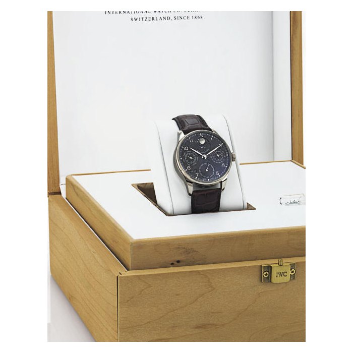 IWC. A FINE AND RARE OVERSIZED 18K WHITE GOLD AUTOMATIC PERPETUAL CALENDAR WRISTWATCH WITH 7-DAY POWER RESERVE AND MOON PHASES SIGNED IWC, SCHAFFHAUSEN, "PORTUGUESE", MOVEMENT NO. 2947516, CASE NO. 3178186, CIRCA 2006