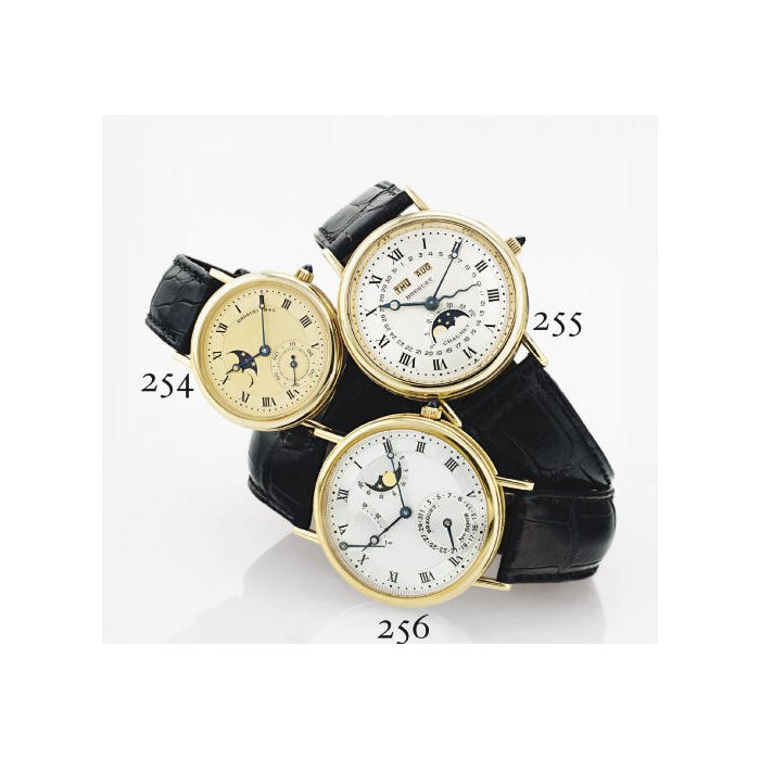 BREGUET. A FINE 18K GOLD AUTOMATIC WRISTWATCH WITH DATE, POWER RESERVE AND MOON PHASES SIGNED BREGUET, NO. 5062E, REF. 3137, CIRCA 2000