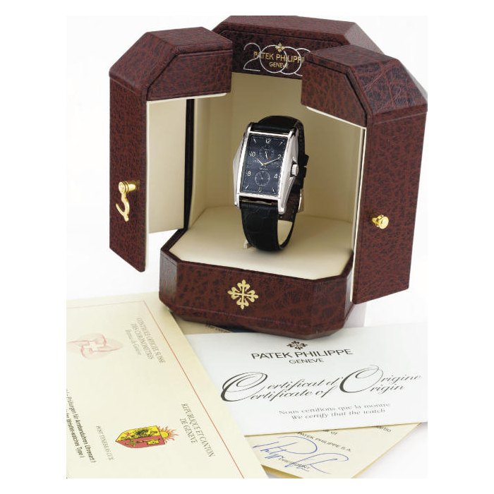 PATEK PHILIPPE. A RARE LIMITED EDITION 18K WHITE GOLD RECTANGULAR 10-DAY WRISTWATCH WITH POWER RESERVE SIGNED PATEK PHILIPPE, GENEVE, "10-DAY", MOVEMENT NO. 3202608, CASE NO. 4124398, REF 5100, CIRCA 2000