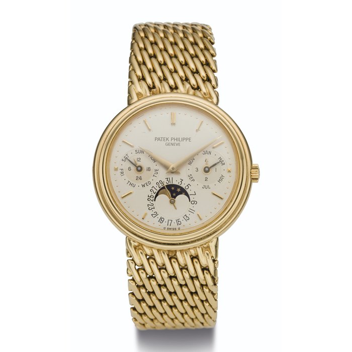 PATEK PHILIPPE, 18K GOLD, PERPETUAL CALENDAR WITH MOON PHASES AND BRACELET, REF. 3945/1