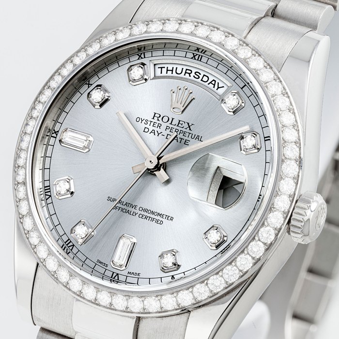 Rolex ROLEX, PLATINUM AND DIAMOND-SET DAY-DATE, REF. 118346, Price & Market Data