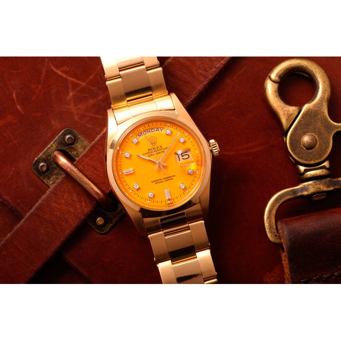 ROLEX, GOLD AND DIAMONDS DAY-DATE WITH YELLOW STELLA DIAL, REF. 1802 CASE NO. 2’550’166