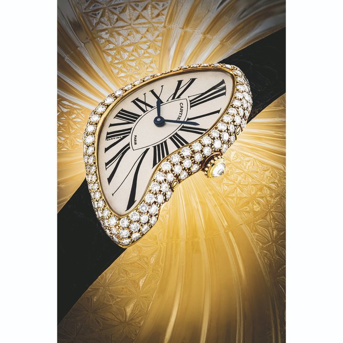 Cartier CARTIER. AN 18K GOLD AND DIAMOND-SET ASYMMETRICAL WRISTWATCH CRASH MODEL, CIRCA 1994