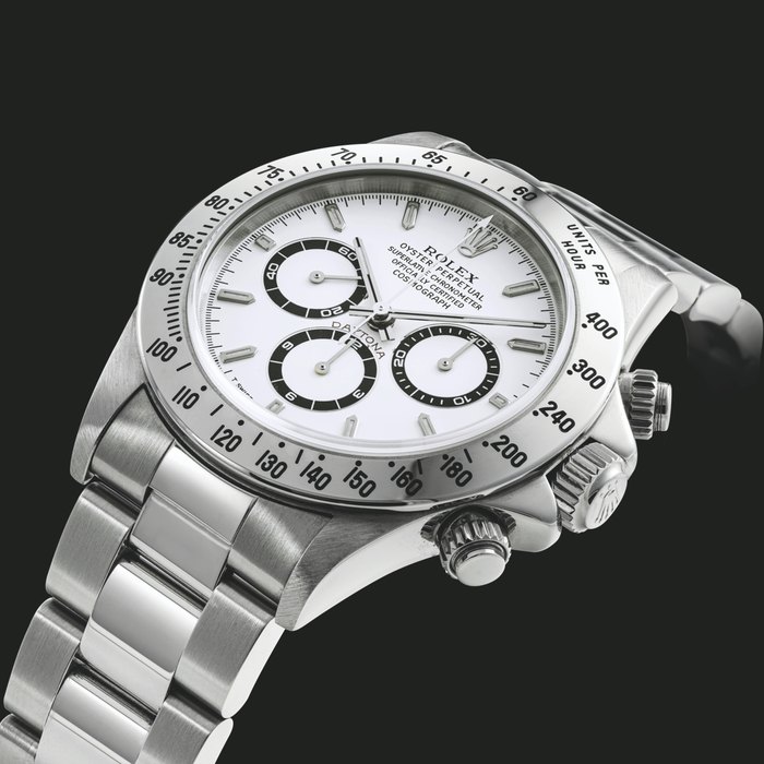 ROLEX. A STAINLESS STEEL AUTOMATIC CHRONOGRAPH WRISTWATCH WITH BRACELET DAYTONA MODEL, REF. 16520, CIRCA 1997