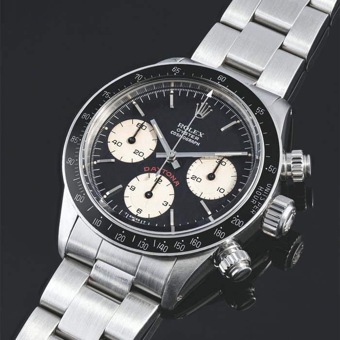 ROLEX. A STAINLESS STEEL CHRONOGRAPH WRISTWATCH WITH BRACELET DAYTONA MODEL, “BIG RED”, REF. 6263, CIRCA 1986