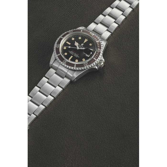 ROLEX. A RARE STAINLESS STEEL AUTOMATIC WRISTWATCH WITH SWEEP CENTRE SECONDS, DATE AND BRACELET SUBMARINER MODEL, REF. 1680 “RED SUBMARINER”, CIRCA 1969
