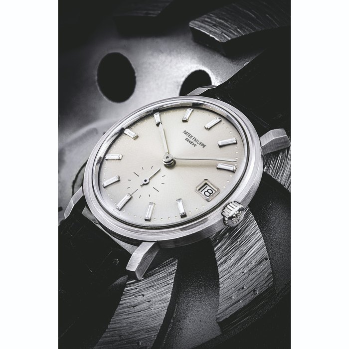 PATEK PHILIPPE. AN EXTREMELY RARE PLATINUM AND BAGUETTE-CUT DIAMOND-SET AUTOMATIC WRISTWATCH WITH DATE REF. 3445, MANUFACTURED IN 1965