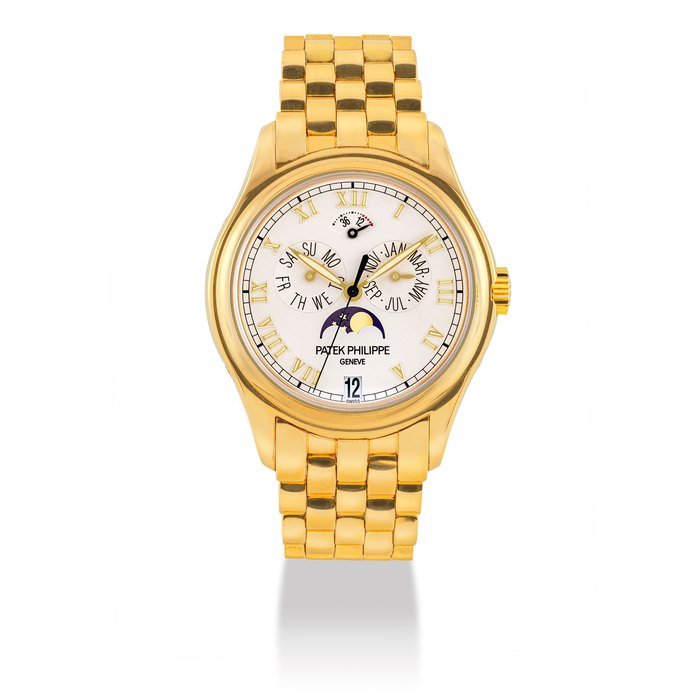 PATEK PHILIPPE, GOLD TRIPLE CALENDAR AND MOONPHASES, REF. 5036/1J