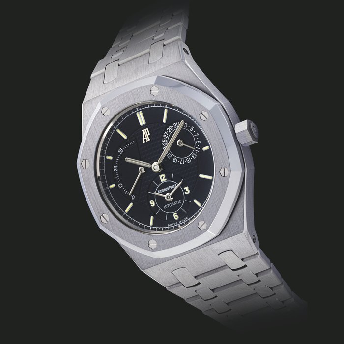AUDEMARS PIGUET. A STAINLESS STEEL DUAL TIME AUTOMATIC WRISTWATCH WITH POWER RESERVE AND DATE ROYAL OAK MODEL , REF. 25730ST, CIRCA 1993