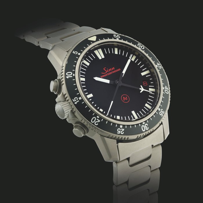 SINN. A TITANIUM CHRONOGRAPH LEFT-HANDED AUTOMATIC WRISTWATCH WITH DATE , CENTRAL CHRONOGRAPH MINUTE HAND AND BRACELET EZM 1 MODEL, CIRCA 2003