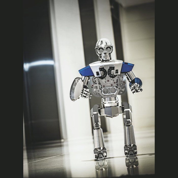 MB&F X L ’ÉPÉ E 1839. A PALLADIUM-PLATED POLISHED BRASS LIMITED EDITION JUMP HOUR ROBOT CLOCK WITH RETROGRADE SECONDS, POWER RESERVE AND MOON PHASE BALTHAZAR BLUE MODEL, LIMITED EDITION TO 50 PIECES, CIRCA 2016