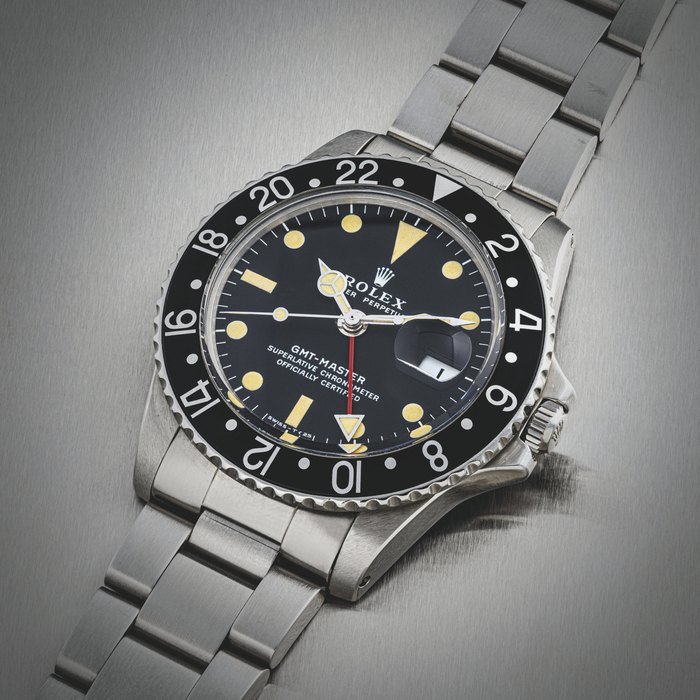 Rolex ROLEX. A STAINLESS STEEL AUTOMATIC DUAL TIME WRISTWATCH WITH SWEEP CENTRE SECONDS, DATE AND BRACELET GMT-MASTER MODEL, REF. 1675, CIRCA 1971 · 1675