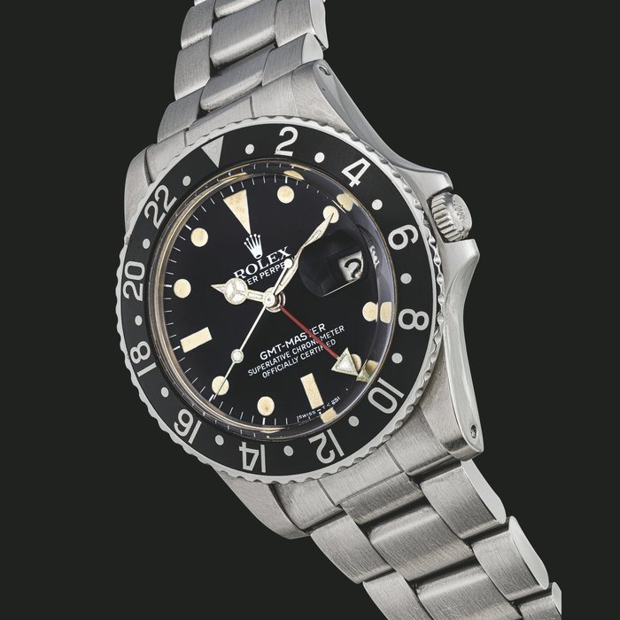 Rolex ROLEX. A STAINLESS STEEL AUTOMATIC DUAL TIME WRISTWATCH WITH SWEEP CENTRE SECONDS, DATE AND BRACELET GMT MASTER MODEL, REF. 16750, CIRCA 1982 · 16750