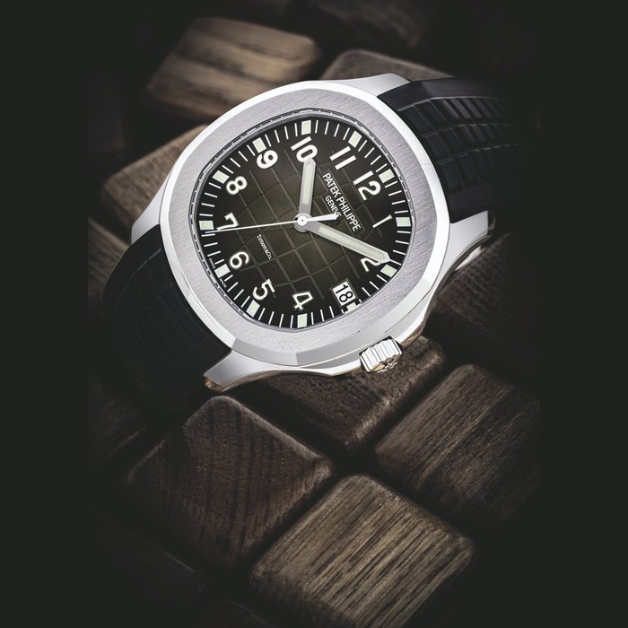 PATEK PHILIPPE. A STAINLESS STEEL AUTOMATIC WRISTWATCH WITH SWEEP CENTRE SECONDS AND DATE, RETAILED BY TIFFANY & CO. AQUANAUT MODEL, REF. 5167⁄1A, CIRCA 2017