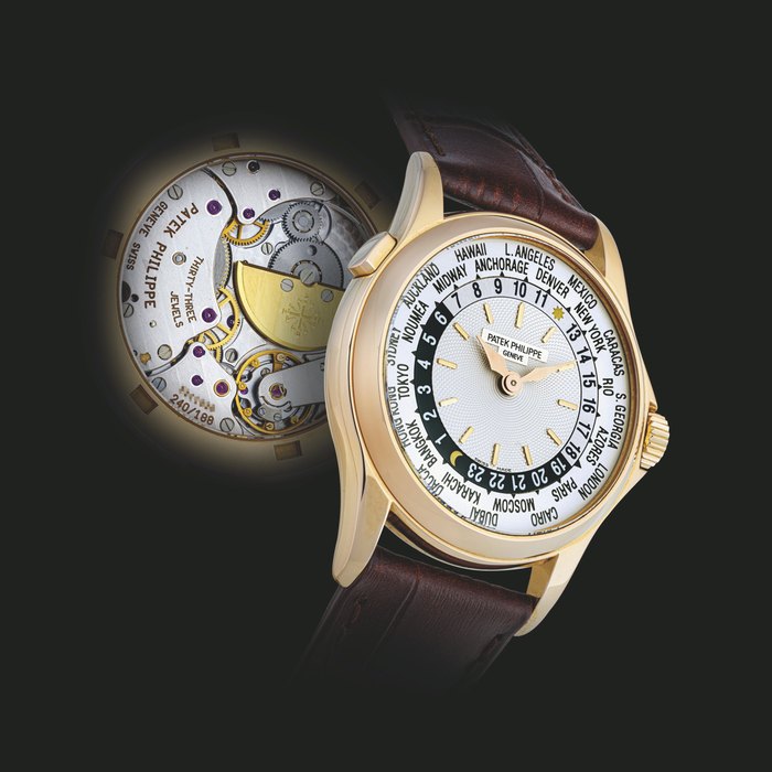 PATEK PHILIPPE. AN 18K PINK GOLD AUTOMATIC WORLD TIME WRISTWATCH REF. 5110, CIRCA 2001