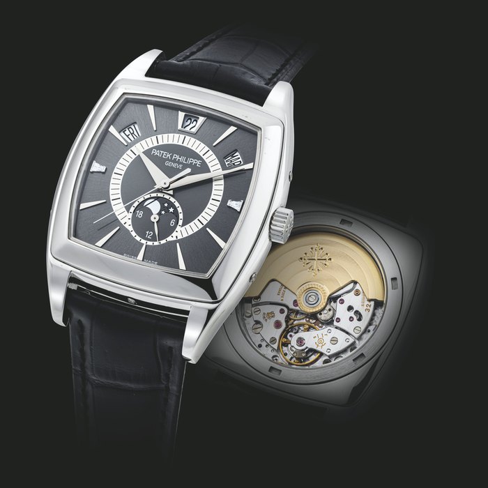PATEK PHILIPPE. A PLATINUM AND DIAMOND-SET AUTOMATIC ANNUAL CALENDAR WRISTWATCH WITH SWEEP CENTRE SECONDS, 24 HOUR INDICATION AND MOON PHASES REF. 5135, CIRCA 2008