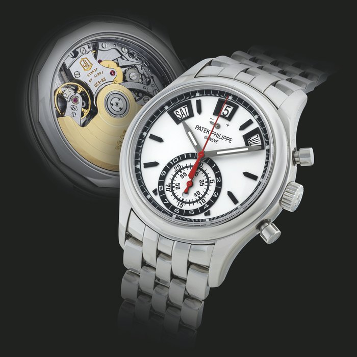 PATEK PHILIPPE. A STAINLESS STEEL AUTOMATIC ANNUAL CALENDAR FLYBACK CHRONOGRAPH WRISTWATCH WITH DAY AND NIGHT INDICATION, POWER RESERVE AND BRACELET REF. 5960, CIRCA 2015