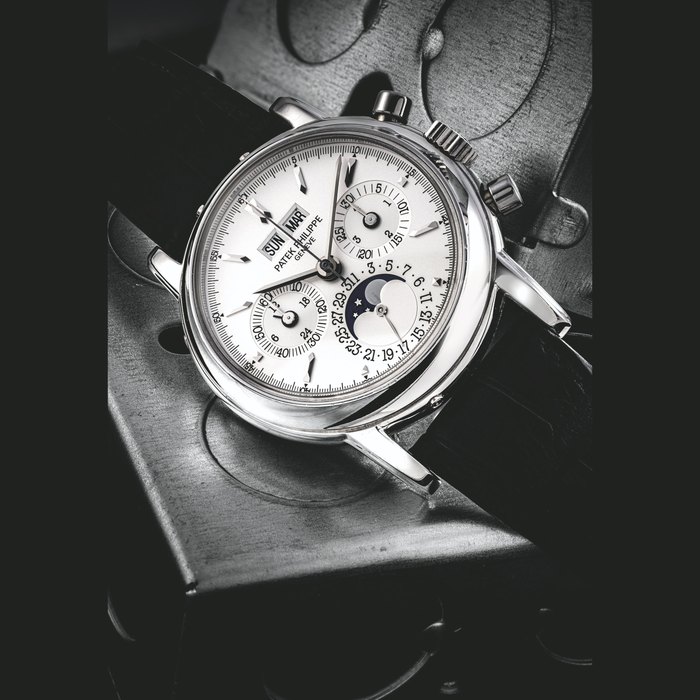 PATEK PHILIPPE. A PLATINUM PERPETUAL CALENDAR CHRONOGRAPH WRISTWATCH WITH MOON PHASES, 24 HOUR AND LEAP YEAR INDICATION REF. 3970E, MANUFACTURED IN 1999