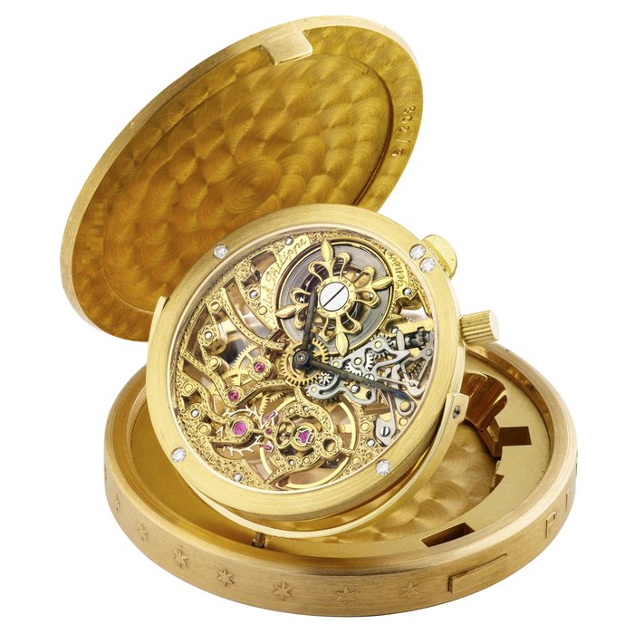 PATEK PHILIPPE. AN 18K GOLD AND DIAMOND-SET COIN WATCH REF. 802⁄3, MANUFACTURED IN 1992