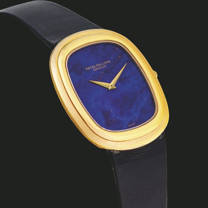PATEK PHILIPPE. AN 18K GOLD WRISTWATCH WITH LAPIS LAZULI DIAL ELLIPSE MODEL, REF. 3630, CIRCA 1977