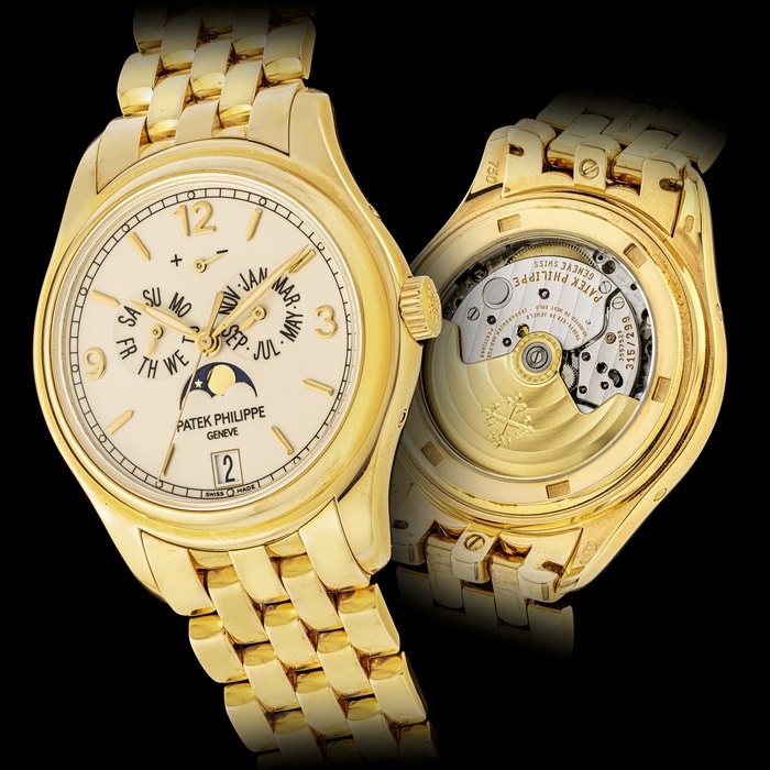 PATEK PHILIPPE, GOLD WITH POWER RESERVE, ANNUAL CALENDAR AND MOONPHASES, REF.5146/1J-001