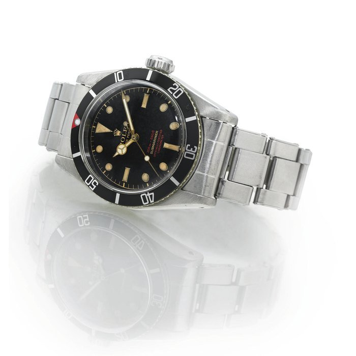 Rolex ROLEX. A FINE AND RARE STAINLESS STEEL AUTOMATIC WRISTWATCH WITH CENTER SECONDS SIGNED ROLEX, OYSTER PERPETUAL, 200M=600FT, "SUBMARINER", CASE NO. 418924, REF. 6538, CIRCA 1959