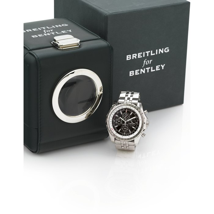 BREITLING. A RARE HEAVY LIMITED EDITION OVERSIZED 18K WHITE GOLD OCTAGONAL AUTOMATIC PERPETUAL CALENDAR CHRONOGRAPH WRISTWATCH WITH SLIDE RULE, MOON PHASES AND BRACELET SIGNED BREITLING, "BENTLEY MULLINER", CASE NO. 780849, REF. NO. J29362, NO., CIRCA 2005