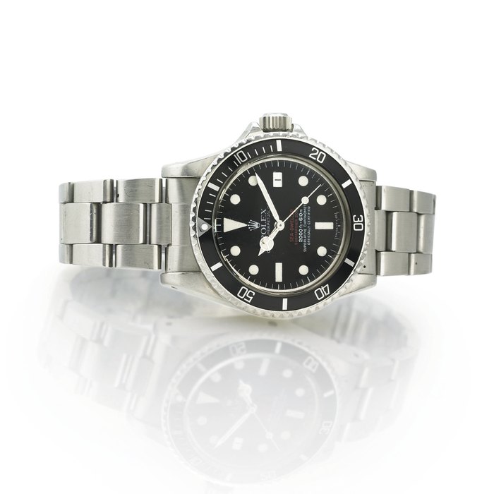 ROLEX. A FINE AND RARE STAINLESS STEEL AUTOMATIC WRISTWATCH WITH CENTER SECONDS, DATE AND BRACELET SIGNED ROLEX, OYSTER PERPETUAL DATE, "SEA-DWELLER, SUBMARINER 2000" 2000FT=610M, CASE NO. 5034351, REF. 1665, CIRCA 1979