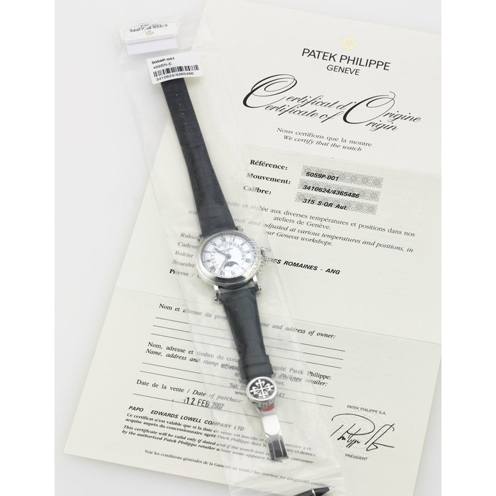 PATEK PHILIPPE. AN EXTREMELY FINE AND RARE PLATINUM AUTOMATIC PERPETUAL CALENDAR WRISTWATCH WITH CENTER SECONDS, RETROGRADE DATE AND MOON PHASES SIGNED PATEK PHILIPPE, GENEVE, MOVEMENT NO. 3410624, CASE NO. 4365486, REF. 5059, CIRCA 2006