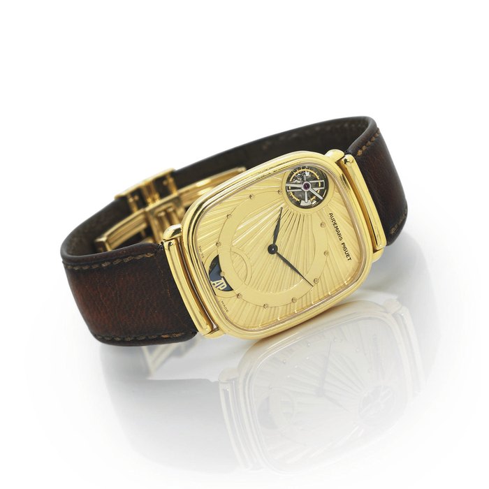 AUDEMARS PIGUET. A RARE SLIM 18K GOLD CUSHION AUTOMATIC TOURBILLON WRISTWATCH SIGNED AUDEMARS PIGUET, NO. 198, REF. 25643, CIRCA 1988