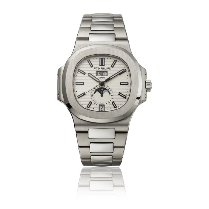 PATEK PHILIPPE. A STAINLESS STEEL AUTOMATIC ANNUAL CALENDAR WRISTWATCH WITH SWEEP CENTRE SECONDS, MOON PHASES, 24 HOUR INDICATION, BRACELET, CERTIFICATE OF ORIGIN AND BOX SIGNED PATEK PHILIPPE, GENEVE, NAUTILUS MODEL, REF. 5726, CIRCA 2017