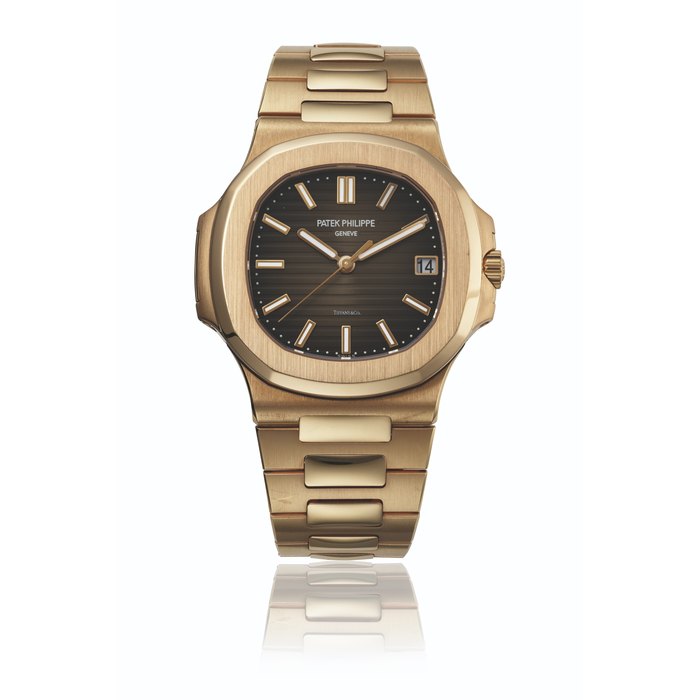 PATEK PHILIPPE. AN EXTREMLY RARE 18K PINK GOLD AUTOMATIC WRISTWATCH WITH SWEEP CENTRE SECONDS, DATE, BRACELET, CERTIFICATE OF ORIGIN AND BOX SIGNED PATEK PHILIPPE, GENEVE, RETAILED BY TIFFANY & CO., NAUTILUS MODEL, REF. 5711, CIRCA 2016