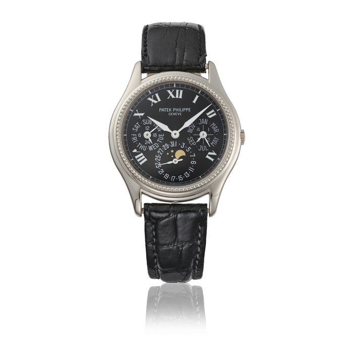 PATEK PHILIPPE. A VERY RARE 18K WHITE GOLD LIMITED SERIES AUTOMATIC PERPETUAL CALENDAR WRISTWATCH WITH MOON PHASES SIGNED PATEK PHILIPPE, GENEVE, REF. 5038, MOVEMENT NO. 776'112, CASE NO. 4'008'255, MANUFACTURED IN 1997