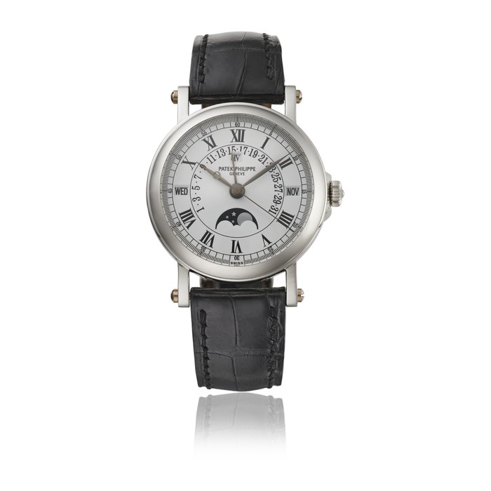 PATEK PHILIPPE. A RARE PLATINUM AUTOMATIC PERPTUAL CALENDAR WRISTWATCH WITH SWEEP CENTRE SECONDS, RETROGRADE DATE, MOON PHASES, LEAP YEAR INDICATION, CERTIFICATE OF ORIGIN AND BOX SIGNED PATEK PHILIPPE, GENEVE, REF. 5059, MANUFACTURED IN 2004