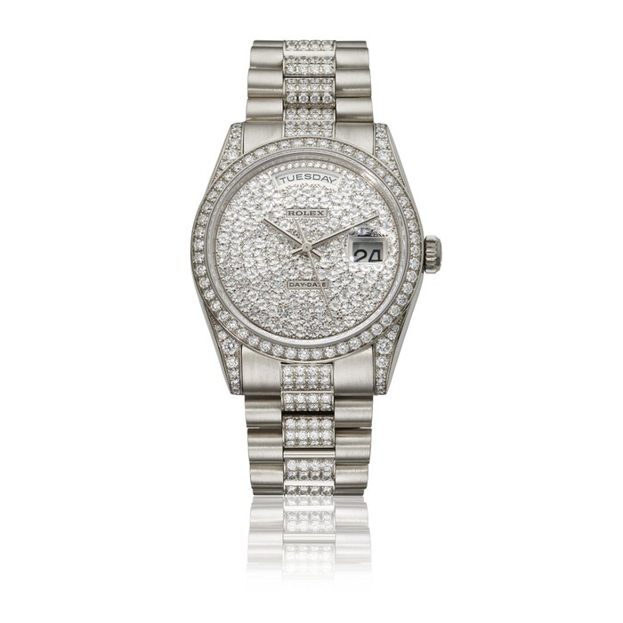 ROLEX. A POSSIBLY UNIQUE AND EXTREMELY ATTRACTIVE PLATINUM AND DIAMOND-SET AUTOMATIC WRISTWATCH WITH SWEEP CENTRE SECONDS, DAY, DATE, BRACELET AND BOX SIGNED ROLEX, DAY-DATE MODEL, REF. 118386, CASE NO. K593784, CIRCA 2001