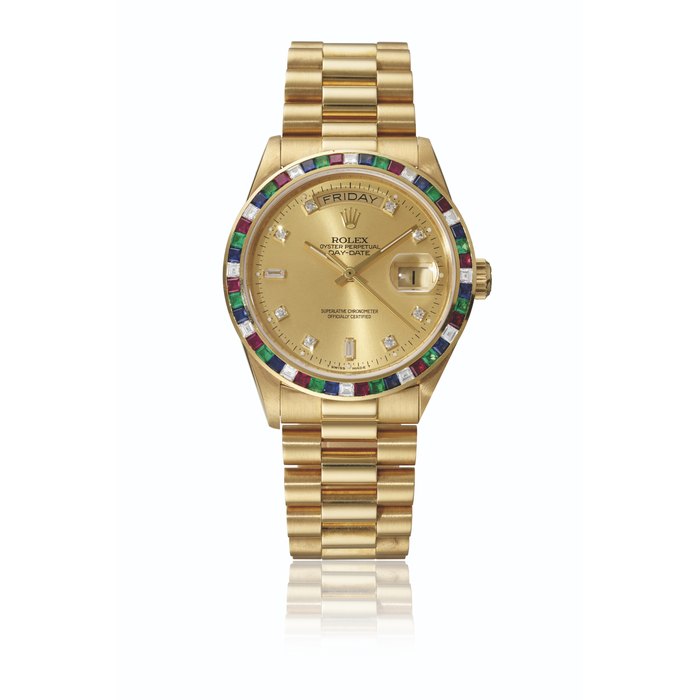 ROLEX. A VERY RARE AND ATTRACTIVE 18K GOLD, DIAMOND, RUBY, EMERALD AND SAPPHIRE-SET AUTOMATIC WRISTWATCH WITH SWEEP CENTRE SECONDS, DAY, DATE, BRACELET AND GUARANTEE SIGNED ROLEX, DAY-DATE MODEL, REF. 18188, CASE NO. 953'3484, CIRCA 1987