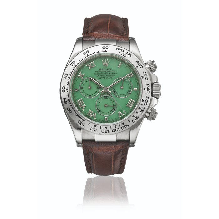 ROLEX. AN 18K WHITE GOLD AUTOMATIC CHRONOGRAPH WRISTWATCH WITH GREEN CHRYSOPRASE DIAL SIGNED ROLEX, DAYTONA 'BEACH' MODEL, REF. 116519, CASE NO. P455271, CIRCA 2000