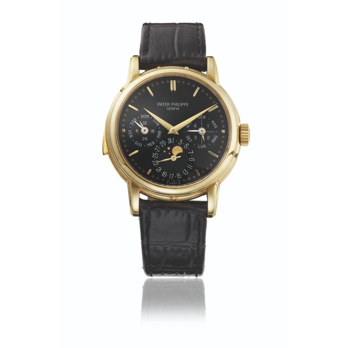 PATEK PHILIPPE. AN EXTREMELY RARE 18K GOLD AUTOMATIC MINUTE REPEATING PERPETUAL CALENDAR WRISTWATCH WITH MOON PHASES, 24 HOUR AND LEAP YEAR AND DAY/NIGHT INDICATION SIGNED PATEK PHILIPPE, GENEVE, REF. 3974, MOVEMENT NO. 1'906'035, CASE NO. 2'867'132, MANUFACTURED IN 1991