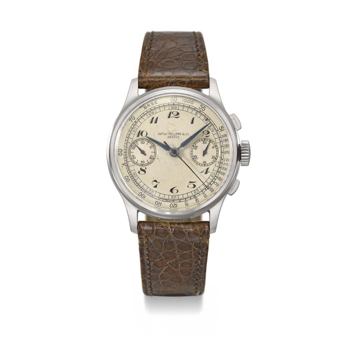 PATEK PHILIPPE, STEEL CHRONOGRAPH WRISTWATCH WITH BREGUET NUMERALS, REF. 130 MOVEMENT NO. 860'494, CASE NO. 653'977