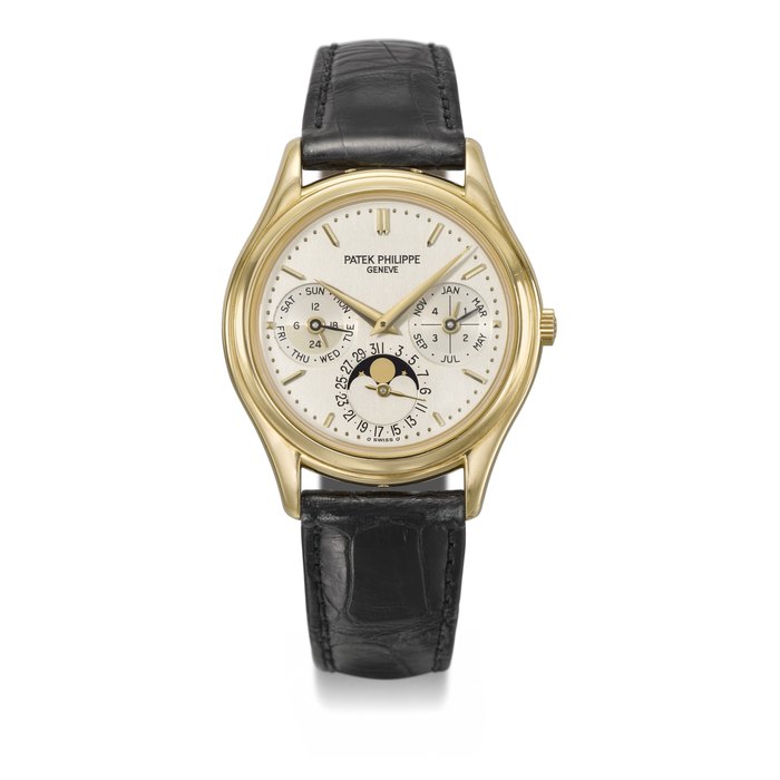 PATEK PHILIPPE, GOLD PERPETUAL CALENDARAND MOON PHASES WITH LATER DIAL, REF. 3940J MOVEMENT NO. 3'124'554, CASE NO. 4'075'995