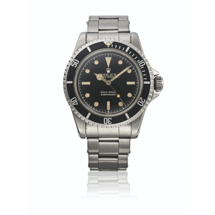 ROLEX. A RARE STAINLESS STEEL AUTOMATIC WRISTWATCH WITH SWEEP CENTRE SECONDS, BLACK LACQUER EXCLAMATION DIAL, POINTED CROWN GUARDS AND BRACELET SIGNED ROLEX, SUBMARINER MODEL, REF. 5512, CASE NO. 818'687, CIRCA 1962