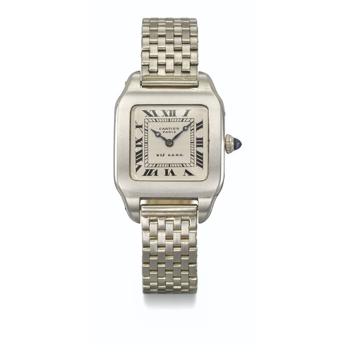 CARTIER. AN EARLY AND VERY RARE PLATINUM AND 18K GOLD SQUARE-SHAPED WRISTWATCH WITH PALLADIUM BRACELET AND BOX SIGNED CARTIER, BTE S.G.D.G., SANTOS MODEL, MOVEMENT SIGNED EUROPEAN WATCH AND CLOCK CO., INC. AND NUMBERED 14'063, CASE NOS. 8998, 14'063, CIRCA 1920