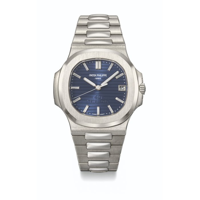 PATEK PHILIPPE. AN EXTREMELY RARE PLATINUM AND DIAMOND-SET LIMITED EDITION AUTOMATIC WRISTWATCH WITH SWEEP CENTRE SECONDS, BRACELET, CERTIFICATES AND BOX - MADE TO COMMEMORATE TH E 40 TH ANNIVERSARY OF THE PATEK PHILIPPE NAUTILUS SIGNED PATEK PHILIPPE, NAUTILUS MODEL, REF. 5711/1P-001, CIRCA 2016