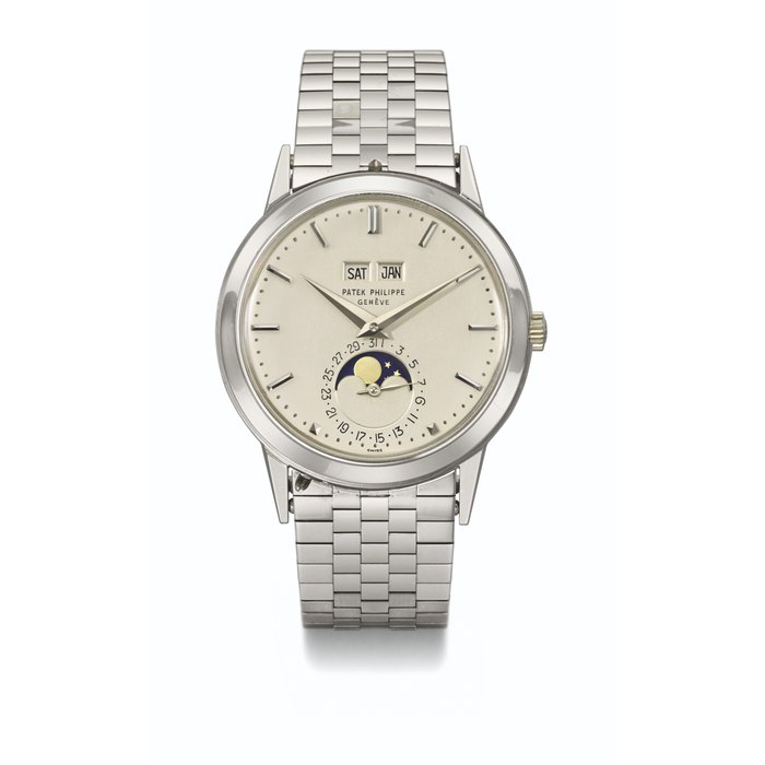PATEK PHILIPPE. A VERY RARE AND HIGHLY ATTRACTIVE 18K WHITE GOLD AUTOMATIC PERPETUAL CALENDAR WRISTWATCH WITH MOON PHASES AND 18K WHITE GOLD PATEK PHILIPPE BRACELET SIGNED PATEK PHILIPPE, GENEVE, REF. 3448G, MOVEMENT NO. 1’119’120, CASE NO. 322’470, MANUFACTURED IN 1970