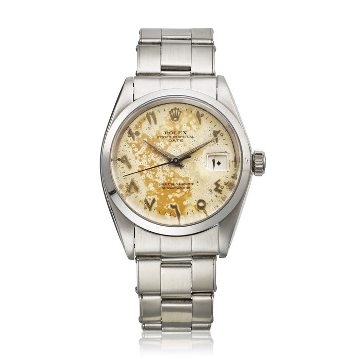 ROLEX, STAINLESS STEEL OYSTER-PERPETUAL DATE WITH TROPICAL DIAL AND EASTERN ARABIC NUMERALS AND DATE, REF. 1500