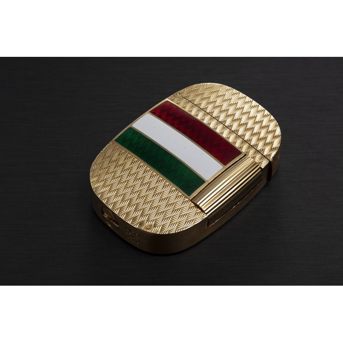 PATEK PHILIPPE, GOLDEN ELLIPSE REF. 9512-1, A GOLD LIGHTER WITH ‘KHANJAR’ AND ENAMEL MADE FOR THE SULTANATE OF OMAN CASE NUMBER: A396