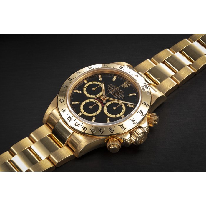 Rolex ROLEX, DAYTONA REF. 16528, A GOLD AUTOMATIC CHRONOGRAPH WRISTWATCH CASE NUMBER: L703’007, MOVEMENT NUMBER: 32’828 · 16528